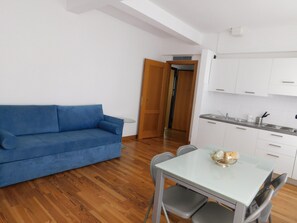 Standard Apartment (Bilocale - 022) | Living room - Fratelli Asquasciati 53 Apartments (Sanremo)