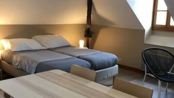 Appartement, 1 slaapkamer | 1 slaapkamer, een strijkplank/strijkijzer, gratis wifi, beddengoed