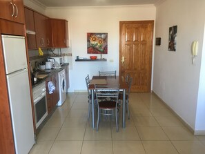 Fridge, microwave, oven, stovetop - Brunella's Apartment Near Tenerife South Airport (Las chafiras)