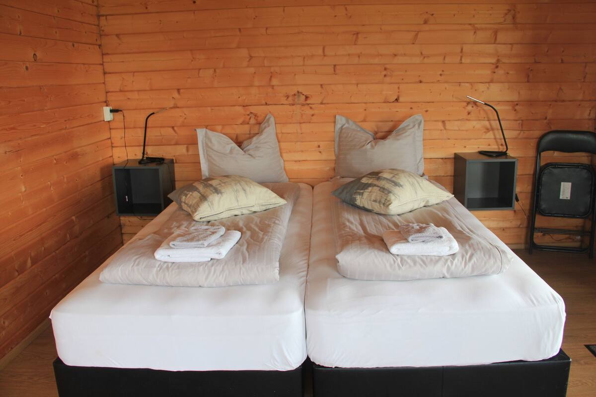 Family Room, Private Bathroom | Blackout drapes, WiFi (free), bed sheets