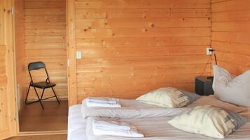 Family Room, Private Bathroom | Blackout drapes, free WiFi, bed sheets