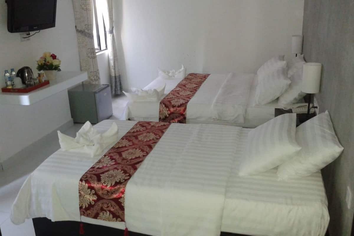 Family Triple Room, Non Smoking | In-room safe, blackout drapes, soundproofing, free WiFi