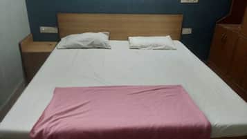 Deluxe Double Non AC Room | In-room safe, blackout curtains, bed sheets