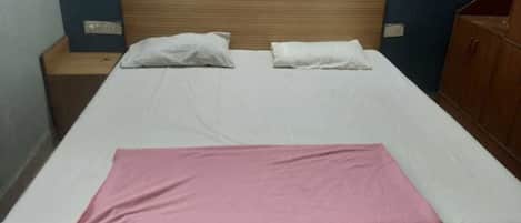 Deluxe Double Non AC Room | In-room safe, blackout drapes, bed sheets