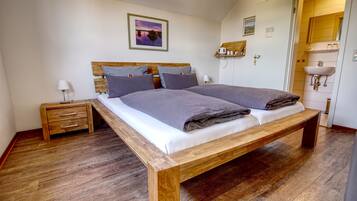 Hypo-allergenic bedding, desk, iron/ironing board, cots/infant beds