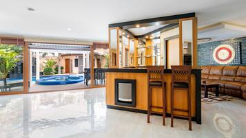 Luxury Villa | Living room | 55-inch flat-screen TV with digital channels, TV, Netflix