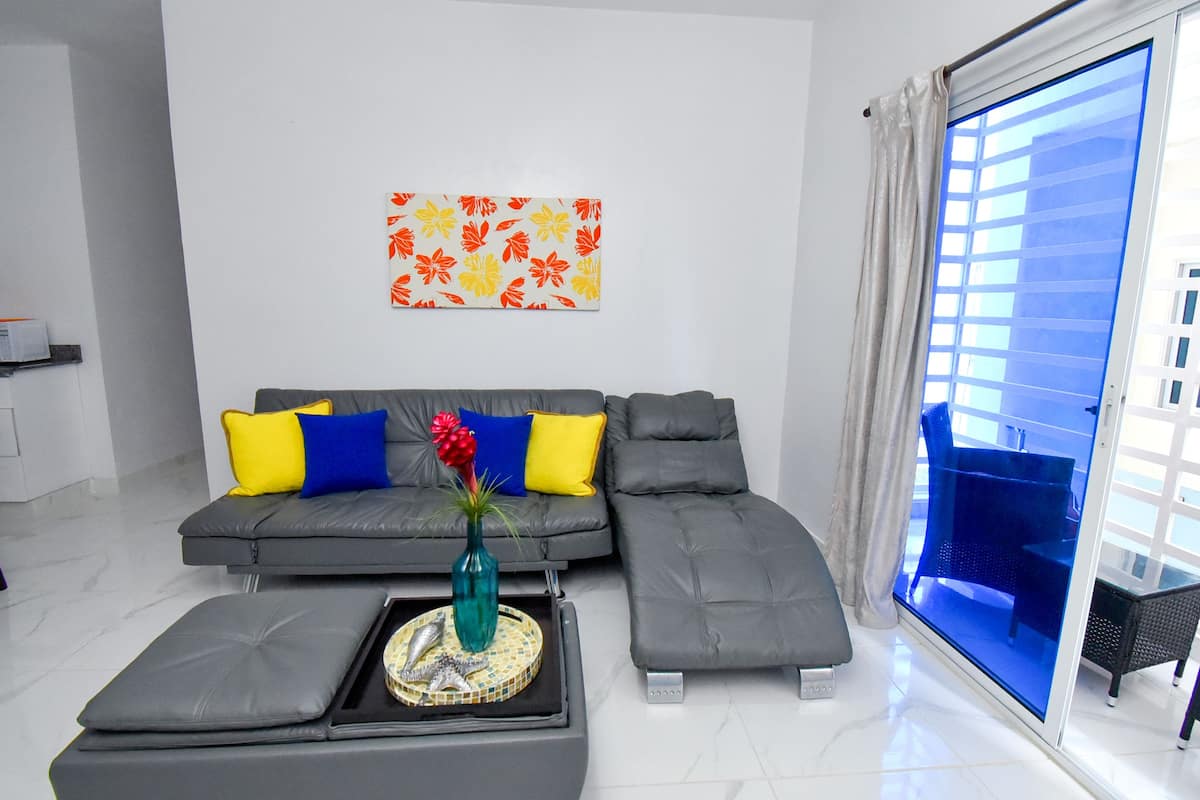 Exclusive Apartment, 2 Bedrooms, Refrigerator & Microwave | Living area | Flat-screen TV