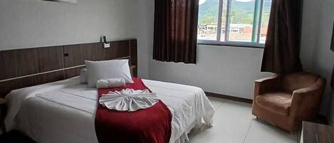 Double Room | Minibar, in-room safe, desk, blackout drapes