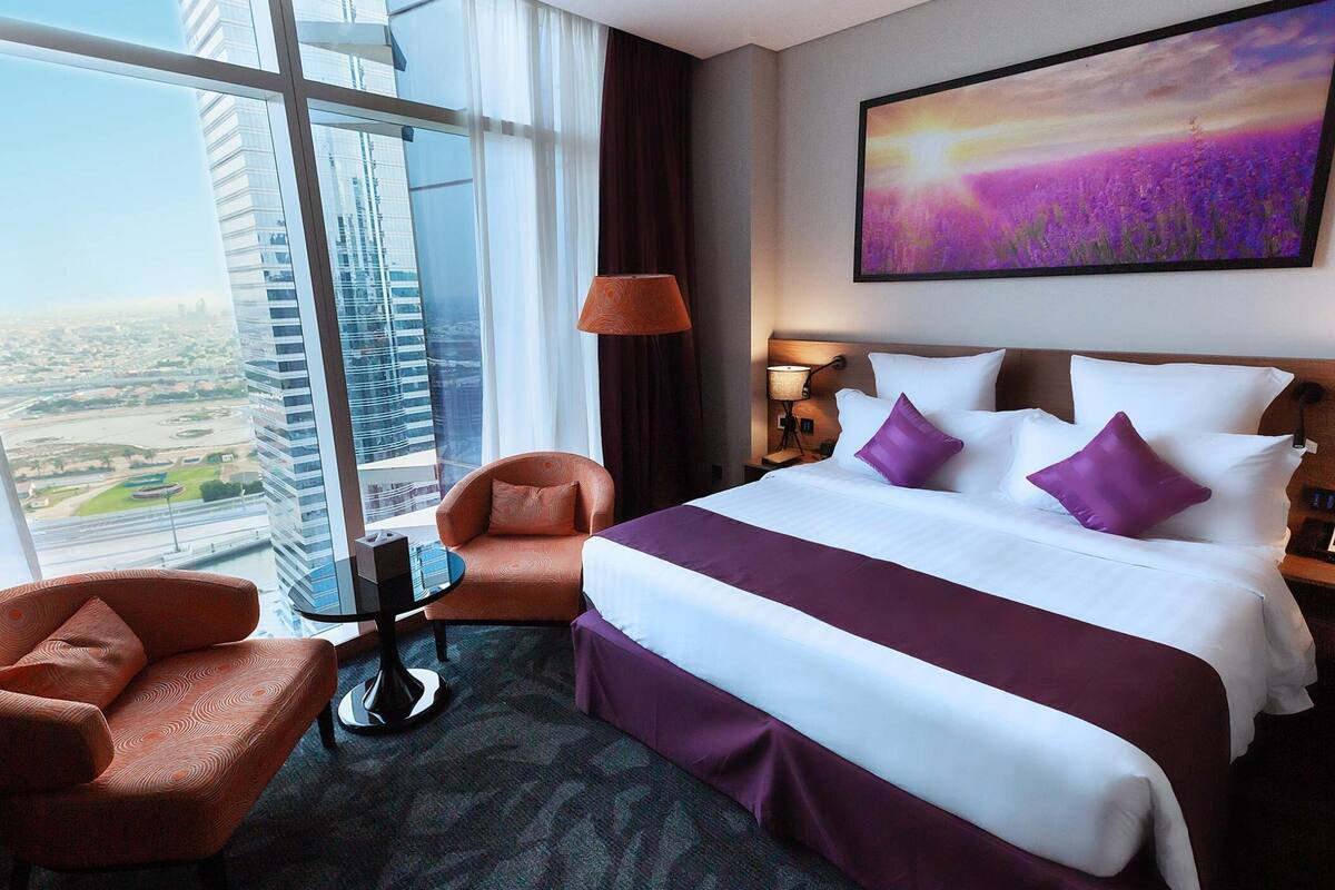 Premium bedding, down comforters, minibar, in-room safe