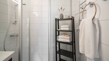 Shower, free toiletries, hair dryer, towels