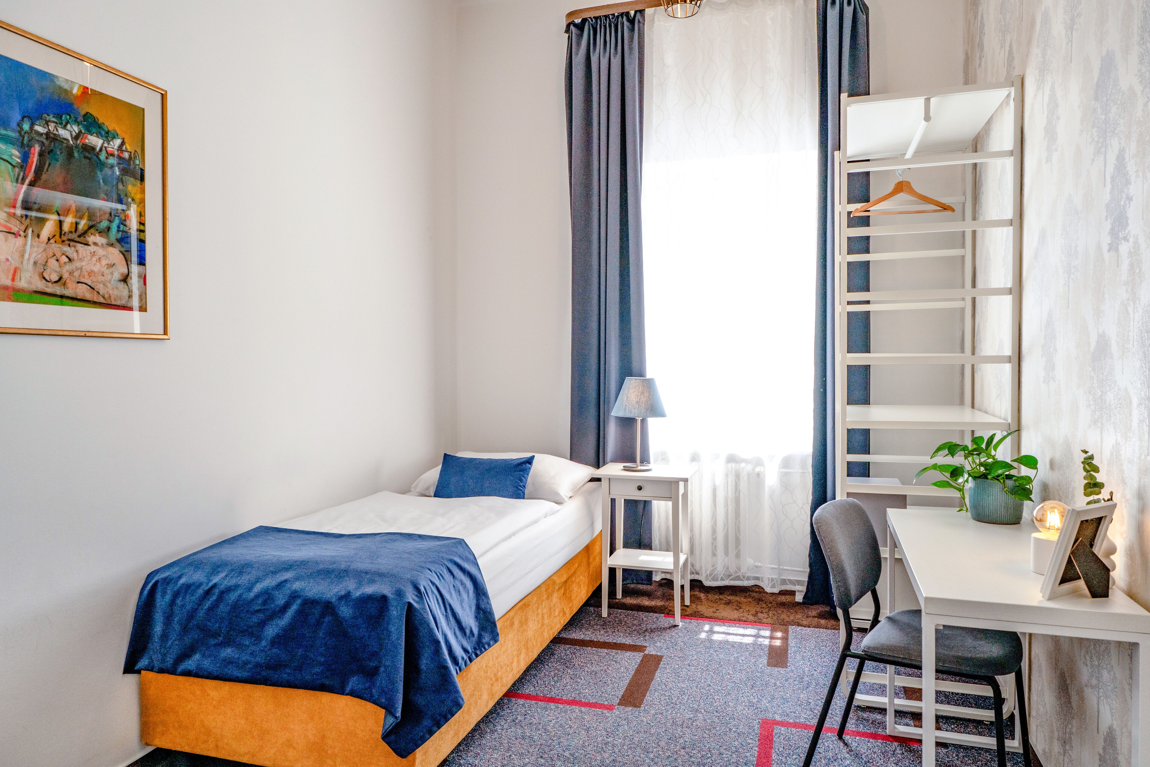 Habitación individual | Escritorio, cortinas opacas, wifi gratis y ropa de cama