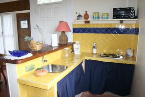 Fridge, microwave, coffee/tea maker, toaster