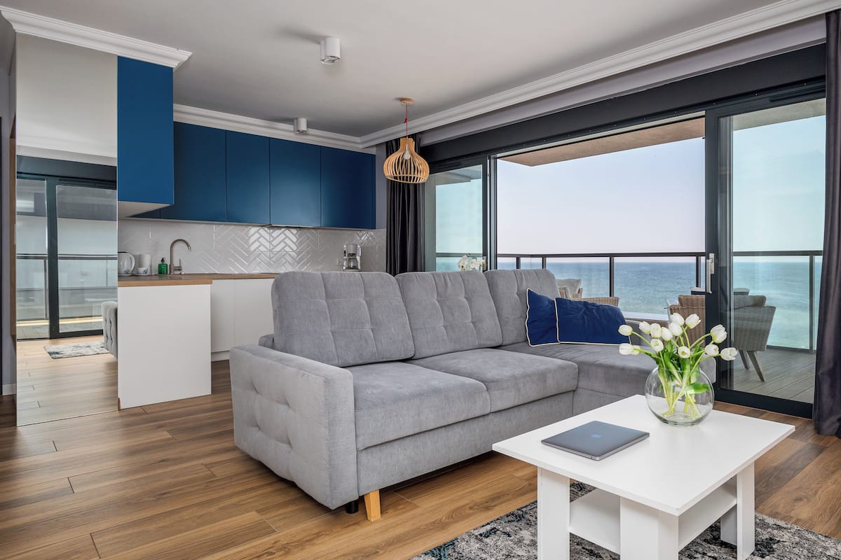 Apartment (25 A - ul. Kaprala Koniecznego 7A) | Living area | Flat-screen TV