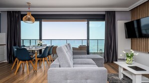 Apartment (25 A - ul. Kaprala Koniecznego 7A) | Living area | Flat-screen TV - Apartamenty Sun & Snow Gardenia (Dziwnów)