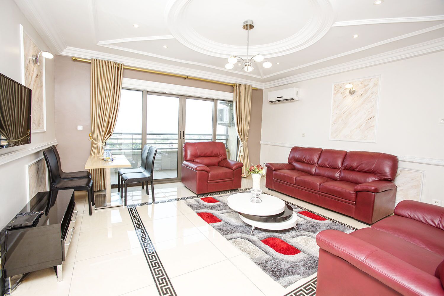 Apartment, 3 Bedrooms | Living room | 32-inch flat-screen TV with cable channels, TV