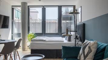 Suite (L with sofa bed) | Wohnbereich | Flachbildfernseher