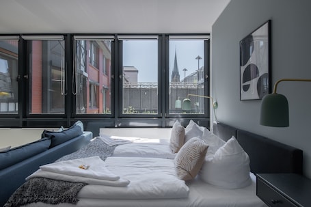 Suite (L with sofa bed) | 1 bedroom, desk, free WiFi, bed sheets