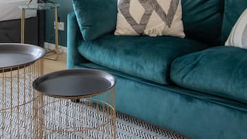 Suite (L with sofa bed) | Living area | Flat-screen TV