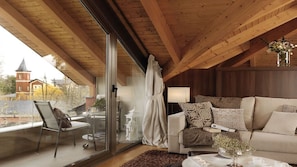 Loft, 3 Bedrooms | Living area | 40-inch flat-screen TV with satellite channels, TV