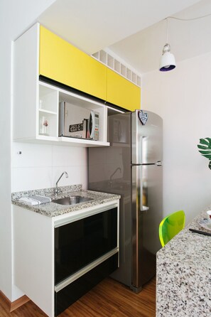 Fridge, microwave, coffee/tea maker, toaster