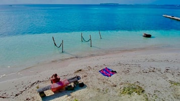 On the beach, white sand, snorkelling, beach bar