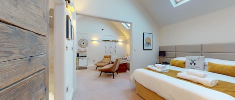 Deluxe King Suite | In-room safe, iron/ironing board, free WiFi, bed sheets