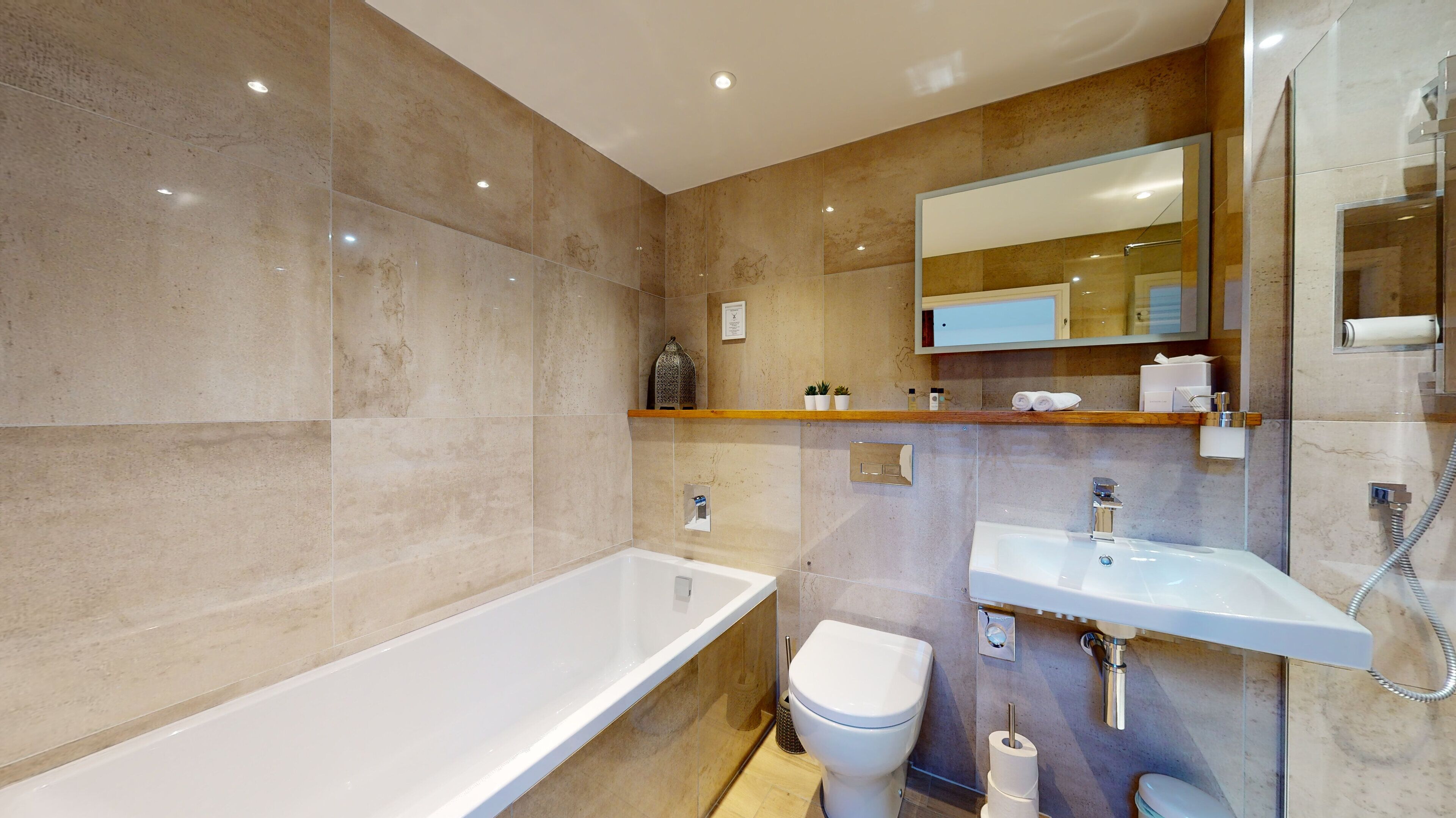 deluxe king suite | bathroom | shower, free toiletries, bathrobes, slippers
