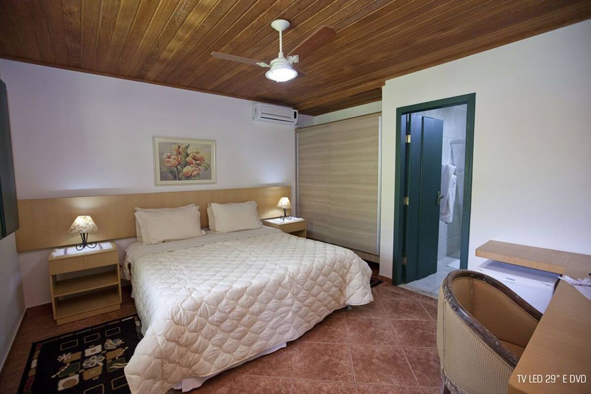 Chalet Deluxe | Minibar, escritorio, cortinas opacas y tabla de planchar con plancha