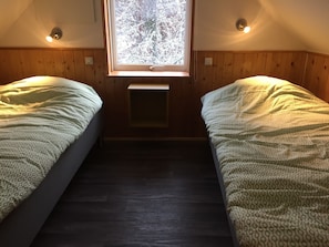 2 habitaciones, cuna de viaje y acceso a internet