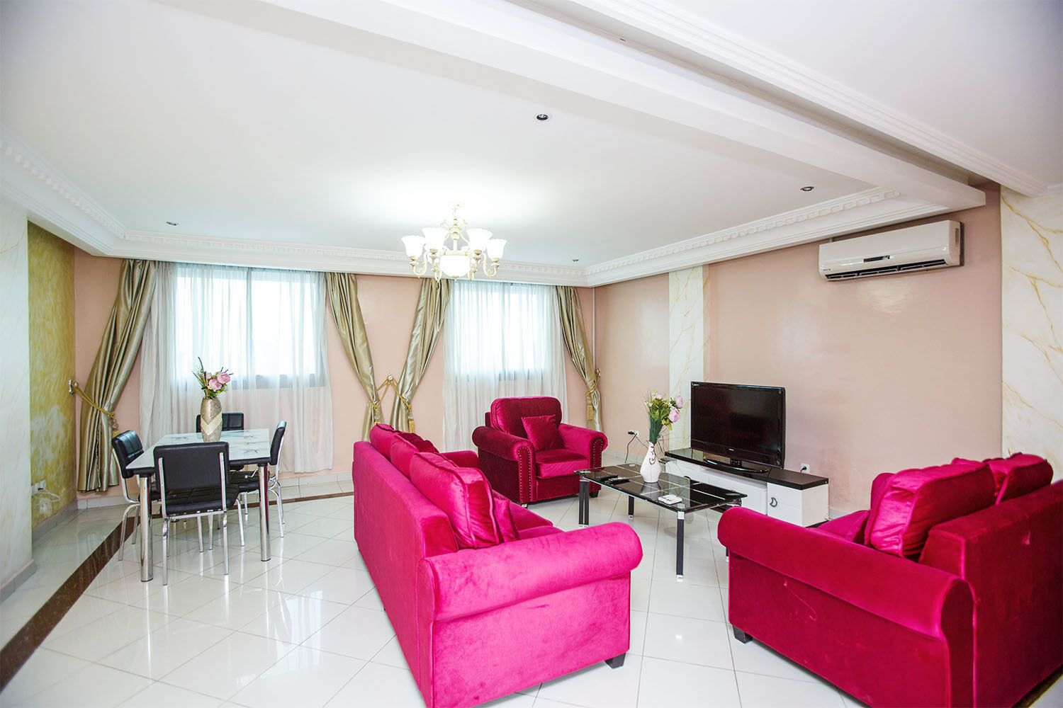 Apartment, 2 Bedrooms | Living room | 32-inch flat-screen TV with cable channels, TV