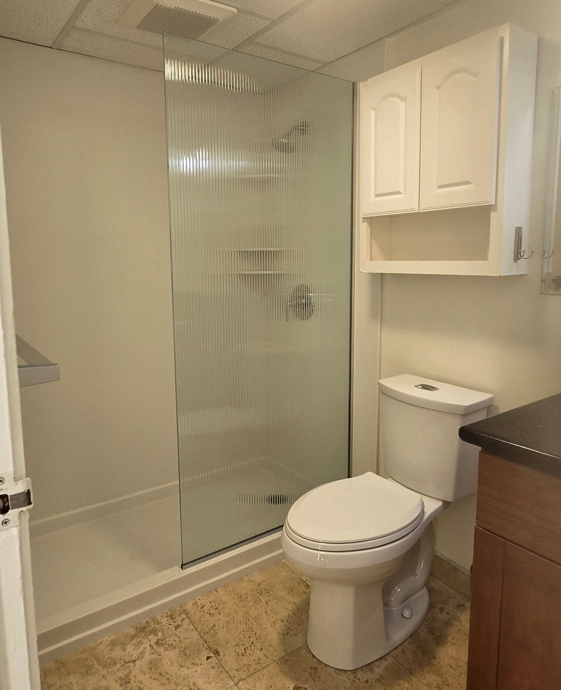 Combined shower/tub, hair dryer, towels, soap