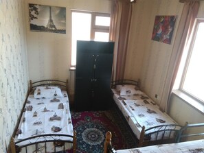 Desk, blackout drapes, soundproofing, iron/ironing board