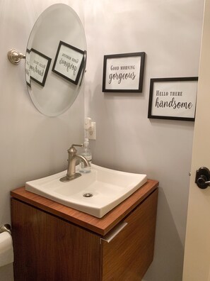Bathtub, hair dryer, towels, soap
