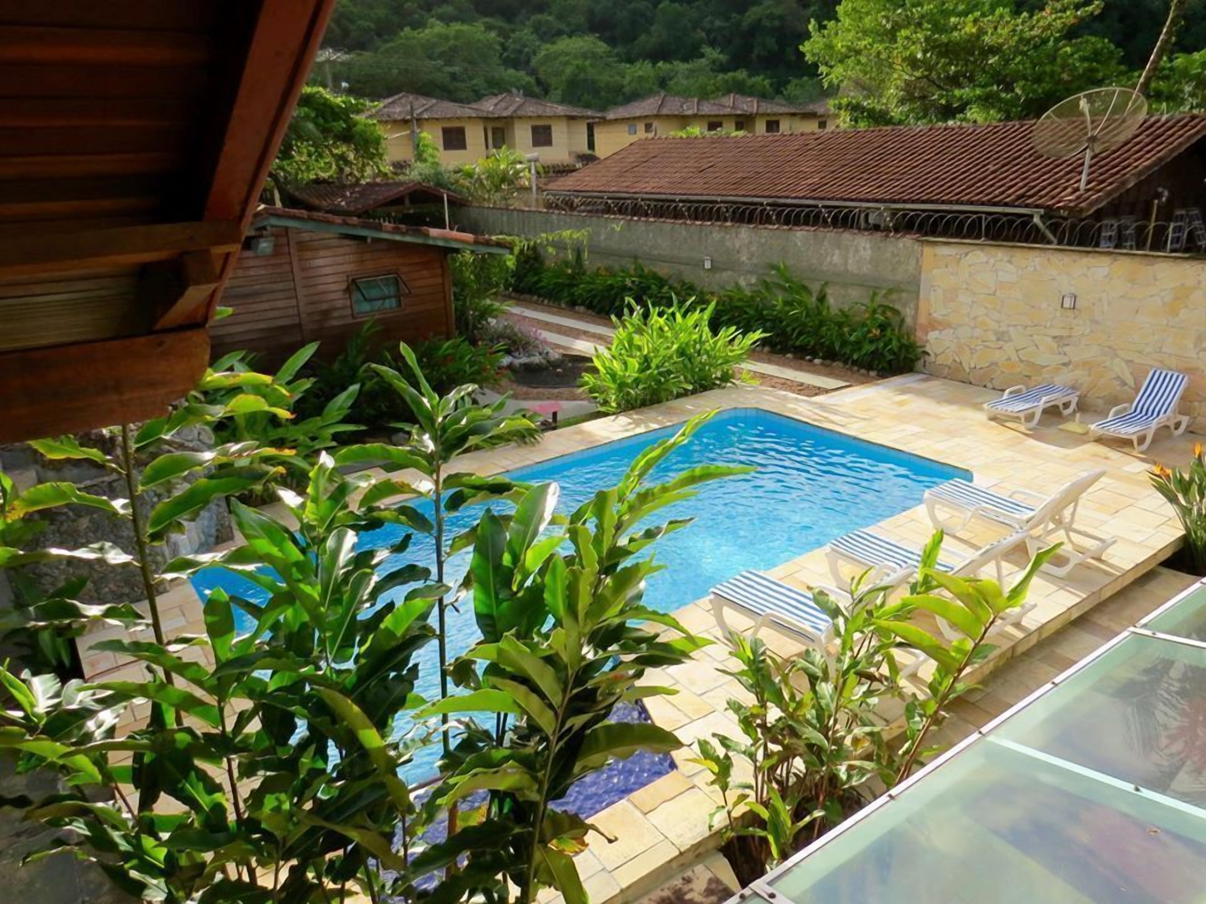 Outdoor pool, pool umbrellas, pool loungers