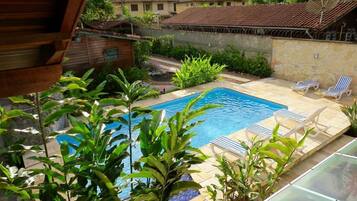 Outdoor pool, pool umbrellas, sun loungers