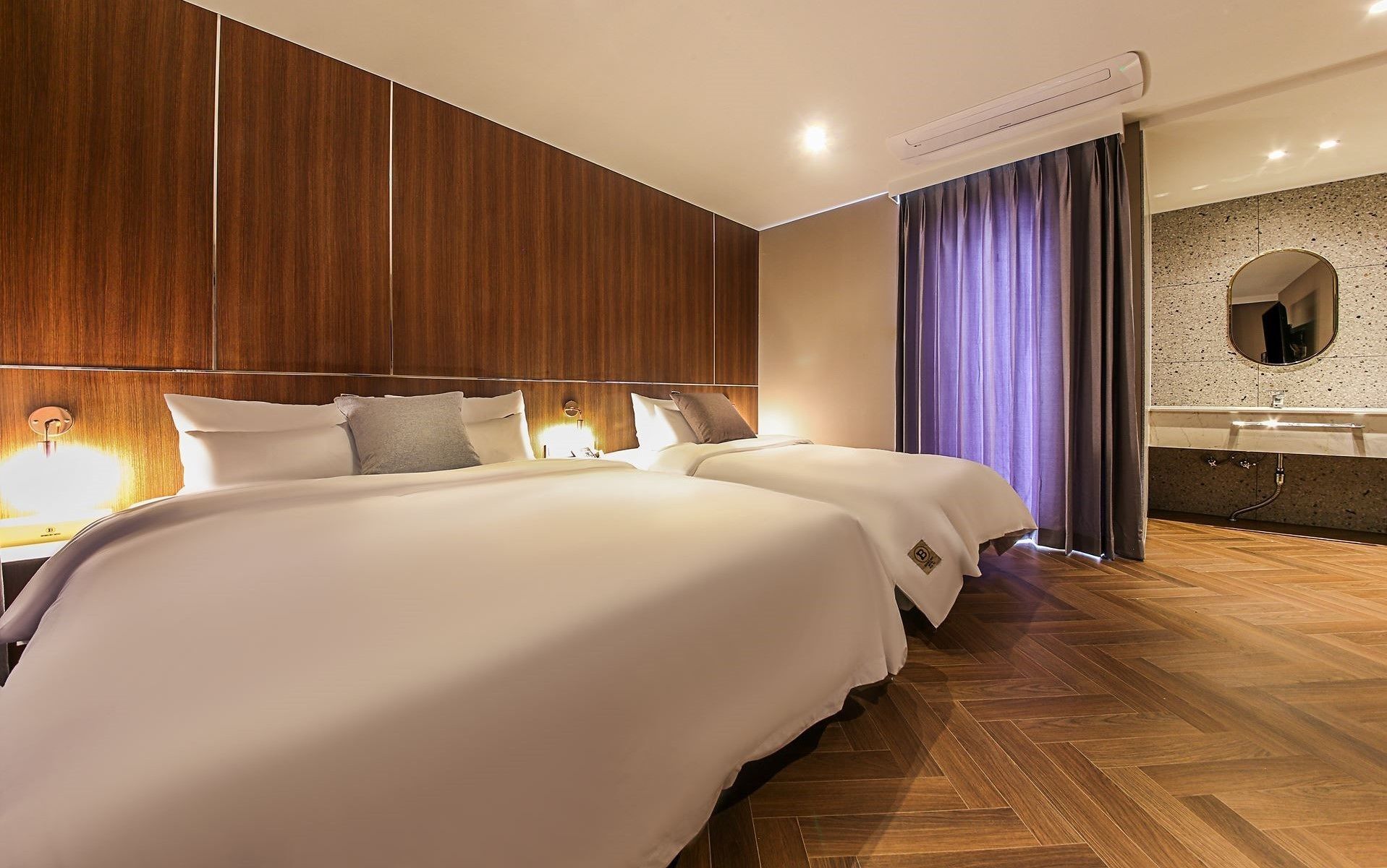 signature royal suite family twin | individually decorated, desk, laptop workspace, soundproofing