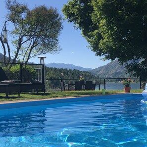 Seasonal outdoor pool, open 9:00 AM to 9:00 PM, pool loungers