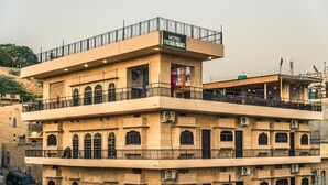 A multi-story building with a sign reading "Hotel Prithvi Palace." - Prithvi Palace (Jaisalmer)