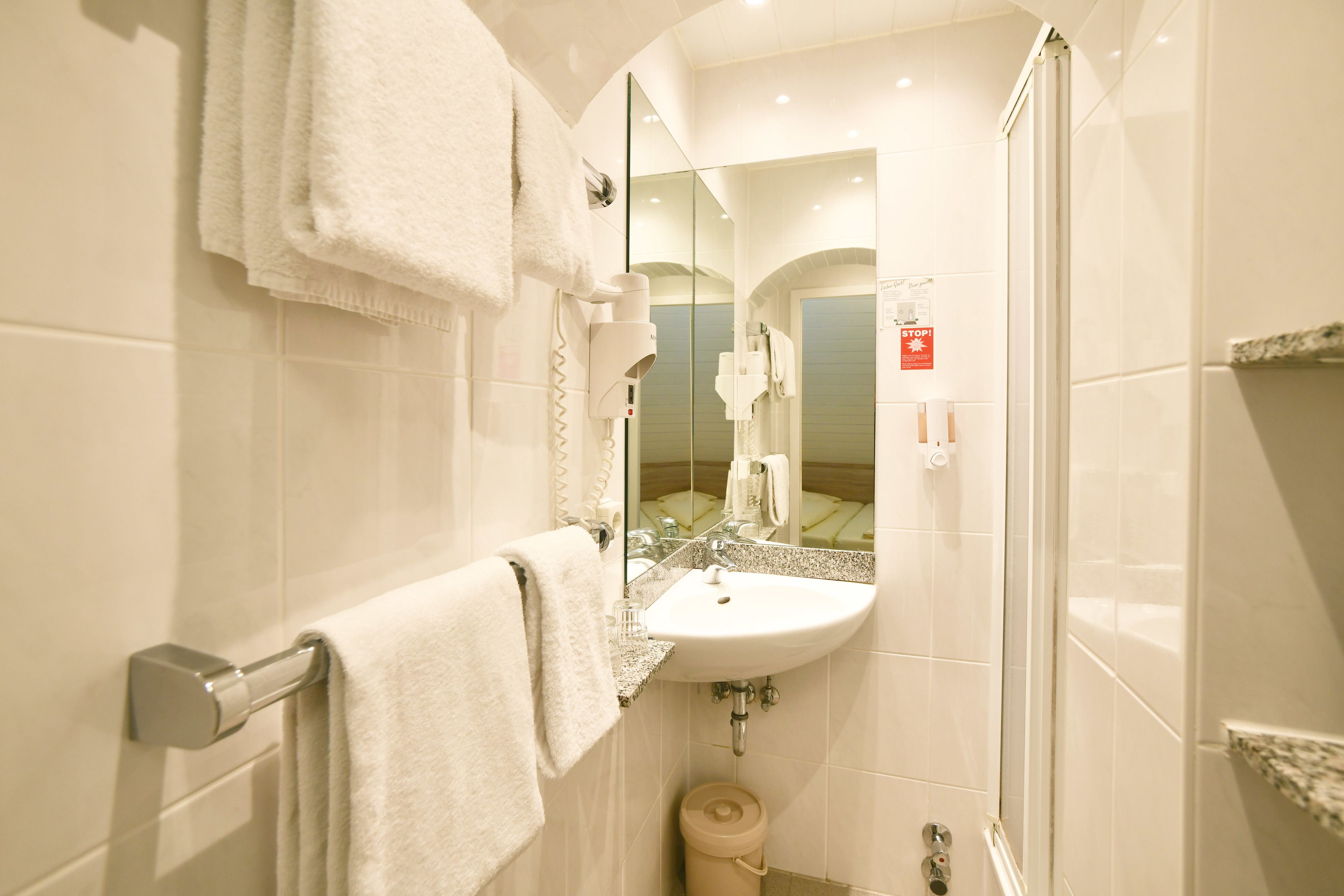 shower, free toiletries, hair dryer, towels