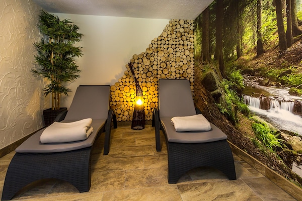 Sauna y tina de hidromasaje
