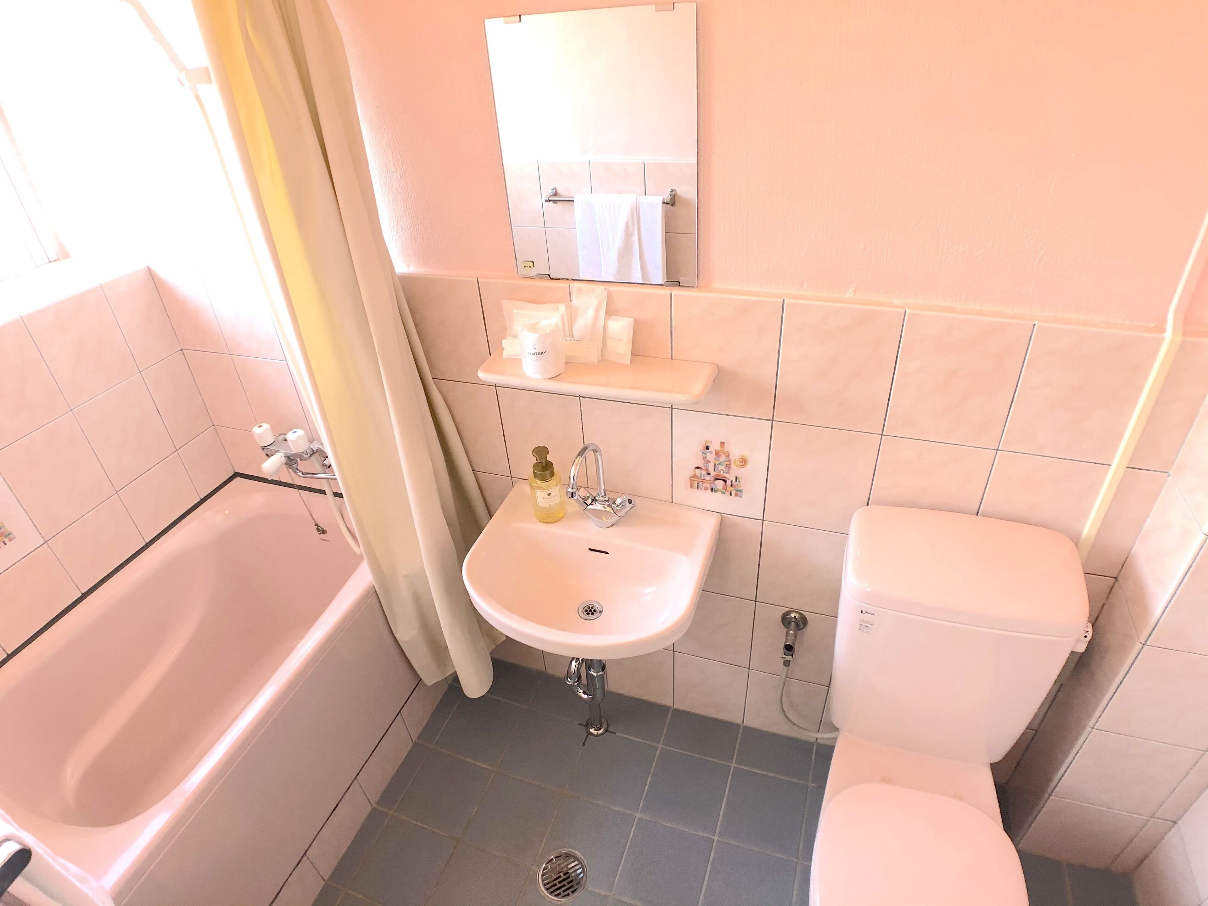 combined shower/bathtub, free toiletries, hair dryer, bathrobes