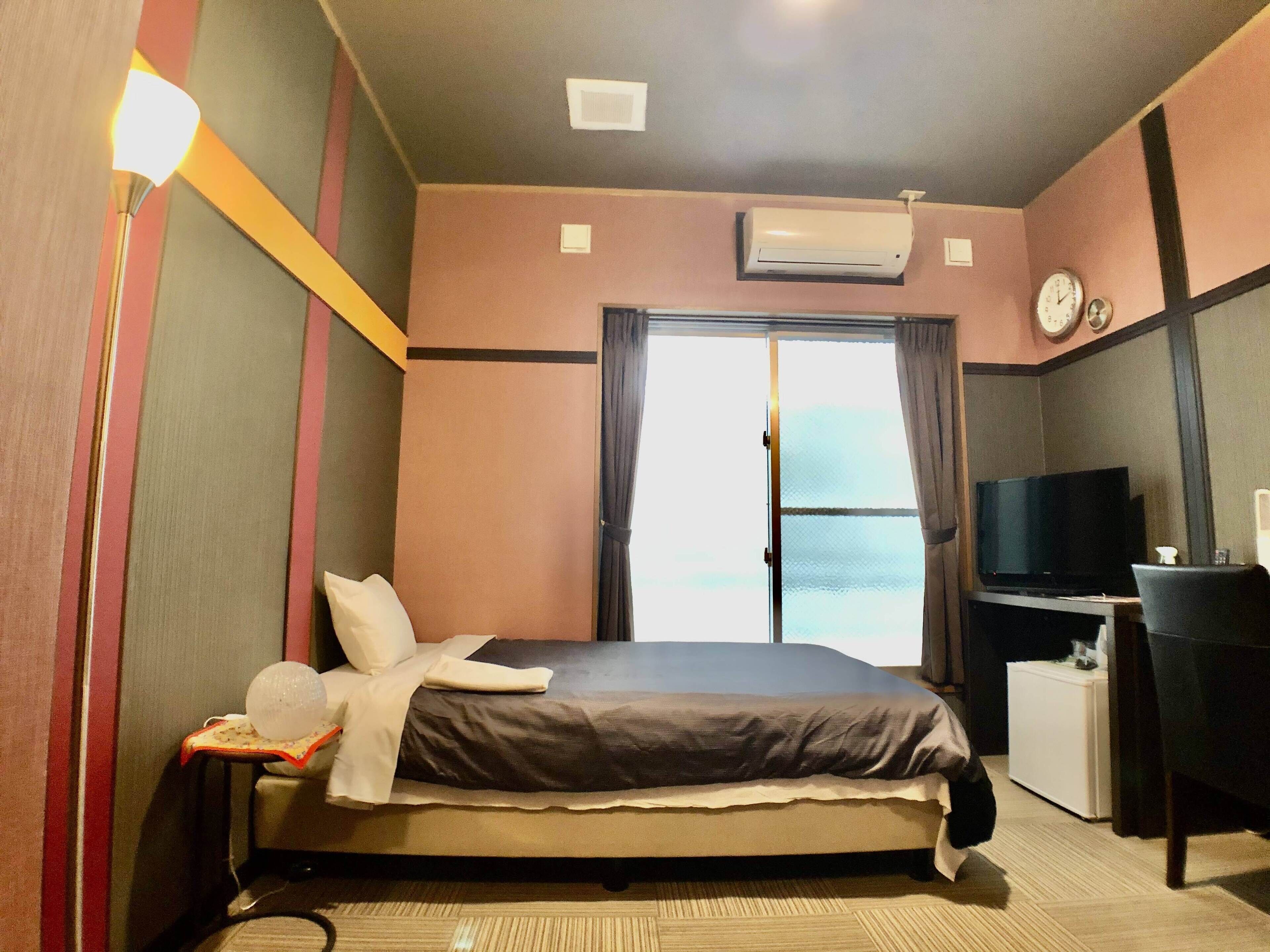 economy double room, non smoking, first floor, must check-in between 3 pm and 6 pm | desk, laptop workspace, iron/ironing board, free wifi