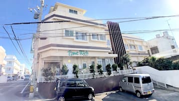 A building with a sign reading "Time Rich."