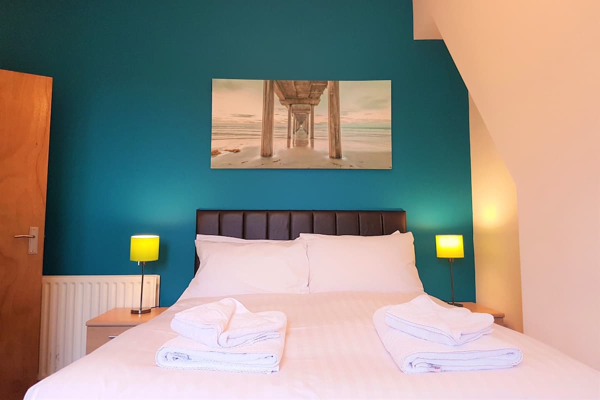 Family Apartment, 1 Bedroom | 1 bedroom, laptop workspace, iron/ironing board, free WiFi