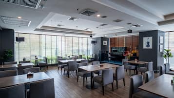 Breakfast, lunch, dinner served; local cuisine