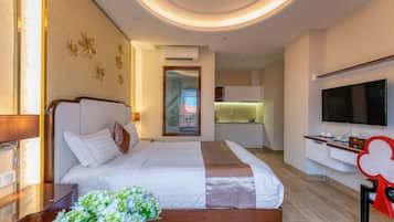 Standard Room (2 Adults + 1 Child) | Minibar, in-room safe, desk, laptop workspace