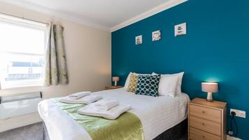 2 soveværelser, premium-sengetøj, arbejdsområde til bærbare computere