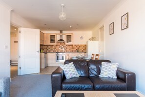 ファミリー アパートメント 2 ベッドルーム | リビング エリア | スマートテレビ、Netflix