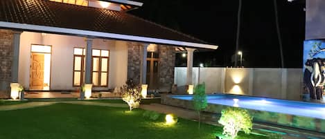 Front of property - evening/night