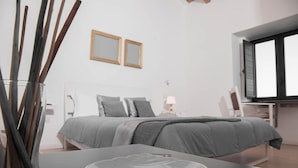 A modern bedroom with a bed, bedside tables, and a TV. - Bookbreakfast (Terme Vigliatore)